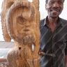 Shepherd Mbanye posing with his work -