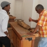 Ishmael Thyssen (right) talking with a student who visited the workshop -