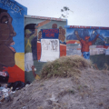 Khanya Mehlo, Liza Jacobs, Ernest Fulani and Shakes Tembani. Mural, Facilitators: Sipho Hlati and Tony Mhayi. Gugulethu Indoor Multisport Complex, 1999