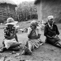 Grandmother-Amy-Madhlawu-Louw-chats-with-neighbours-by-Cedric-Nunn