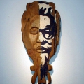 Mask no 1, 2002. Acrylic on carved wood, 16- 45 cm. (Image courtesy of the artist).