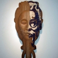 Mask no 2, 2002. Acrylic on carved wood, 16- 45 cm. (Image courtesy of the artist).