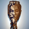 Mask no 3, 2002. Acrylic on carved wood, 16- 45 cm. (Image courtesy of the artist).