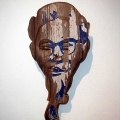 Mask no 4, 2002. Acrylic on carved wood, 16- 45 cm. (Image courtesy of the artist).