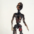 Baghdad Barbie, 2014.  Various plastics, epoxy resin, steel, soot, 19- 26 cm. (Image courtesy of the artist).
