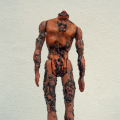 Decapitated Ken, 2014. Various plastics, epoxy resin, steel, soot, 19- 26 cm. (Image courtesy of the artist).