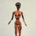 Drone Strike Barbie, 2014. Various plastics, epoxy resin, steel, soot, 19- 26 cm. (Image courtesy of the artist).
