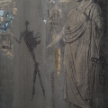 Stele to History 2, 1999-2004. Cement, bone ash, paint flakes, acrylic, dust, silt, lichen, rust stains, gravel, décollage on board, 122 x 199 cm. (Image courtesy of the artist).