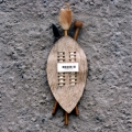Plundered Power, 1997. Wood ash and found objects on board, 29.5 x 39 cm. (Image courtesy of the artist).