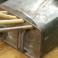 Blik'nSnaar, detail. 1985. Oil tin, bamboo, animal gut strings and wood (Photo: Jurie Senekal)