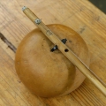Gourd Bow, detail. Circa 1980's. Calabash, stick and wire (Photo: Jurie Senekal)