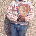Isaac Nkululeko Makeleni - Artist posing with his painting Love and Happiness, c. 1992 (Photo: MP)