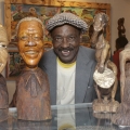 Isaac Nkululeko Makeleni - Posing with works at The Cape Gallery, c. 2006 (Photo: Cape Gallery)