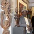Isaac Nkululeko Makeleni - Posing next to sculpture at The Cape Galler (Photo: Cape Gallery)y