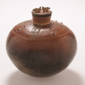 Two Bushpigs Jar, 2006. Smoked terracotta. 23 x 22.5 cm (Image courtesy of Durban Art Gallery)