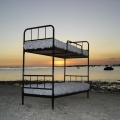 Together we shall sail the world, 2008. Site specific installation with bunker bed and cotton wool, dimensions variable. (Image courtesy of the artist).