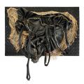 The Haunting, 2019. Recycled rubber and hessian cloth on board, 150 x 100 cm,  (Photo courtesy of Gallery MOMO).