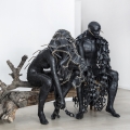 Killing Time, 2017. Recycled rubber tubes, fibreglass cast on found wooden log, 133 x 220 x 80 cm, (Photo courtesy of EBONY/ CURATED).