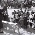 Retired teacher teaching kids outside the Thuthukani Community Centre, 1990. (Image courtesy of the artist)