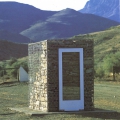 Stone and Time, 1998. Local stone, wire mesh, steel, glass and wood on concrete base, 190 x 300 x 130 cm, In "!Xoe Site-Specific", Nieu Bethesda. (Photo courtesy of the artist)