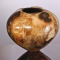 It looks like a girl, Ufana nento-embazane. Ceramics. 25 x 27cm